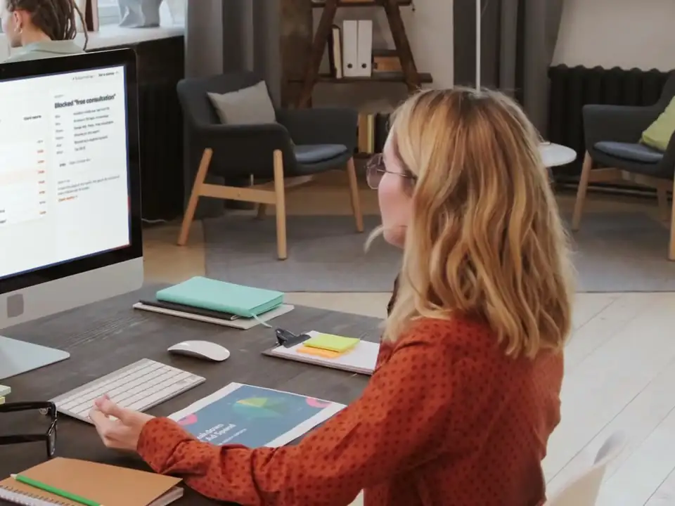 An owner at her desk with Admiral open